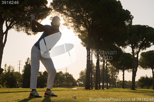 Image of golf player hitting shot
