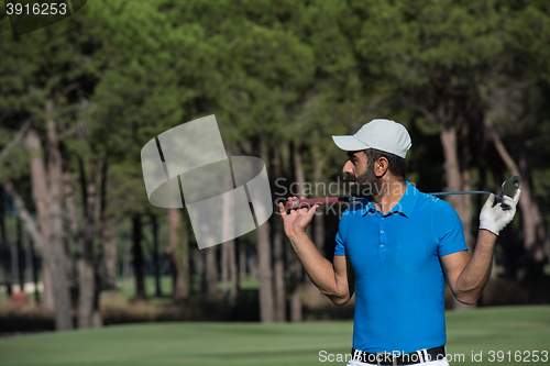 Image of golf player portrait at course