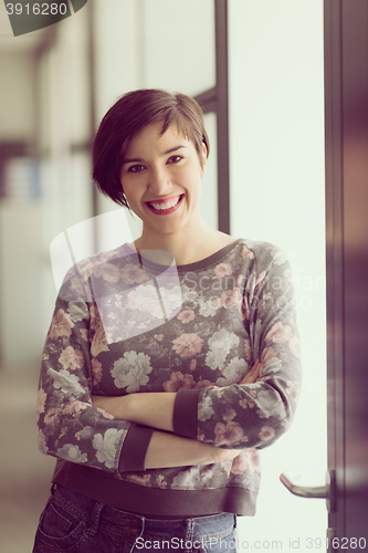 Image of portrait of business woman in casual clothes at startup office