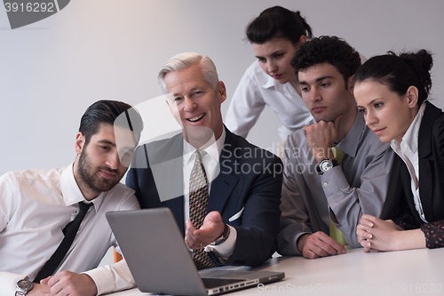 Image of business people group on meeting at modern startup office