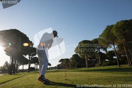 Image of golf player hitting shot