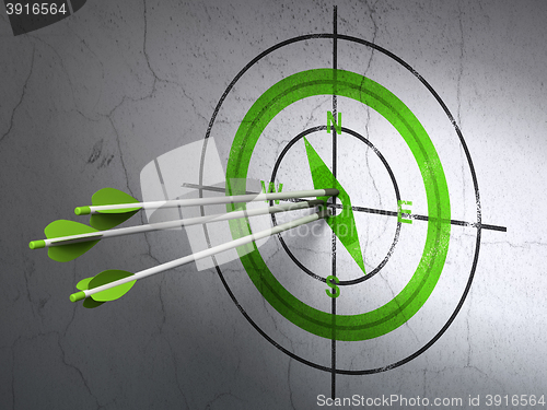 Image of Travel concept: arrows in Compass target on wall background