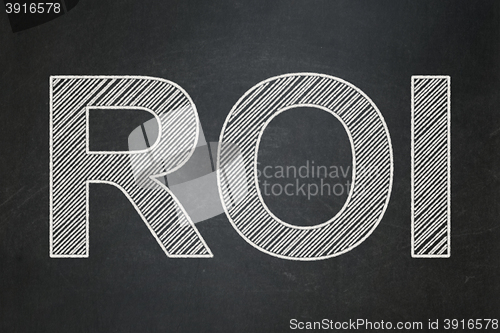 Image of Finance concept: ROI on chalkboard background