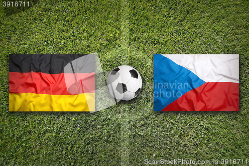 Image of Germany vs. Czech Republic flags on soccer field