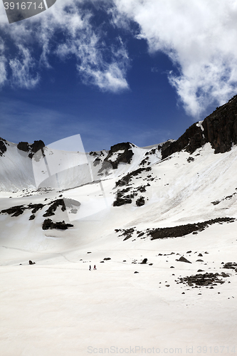 Image of Hikers in snowy mountains