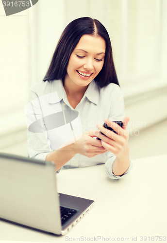 Image of smiling businesswoman or student with laptop