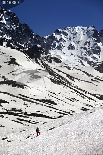 Image of Hiker in snowy mountains