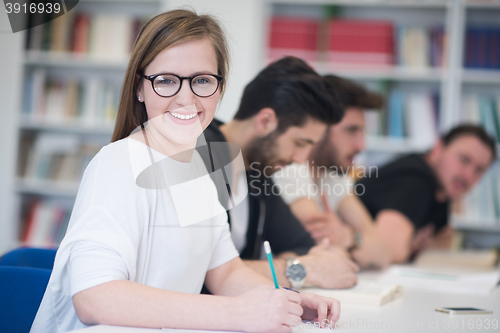 Image of group of students study together in classroom