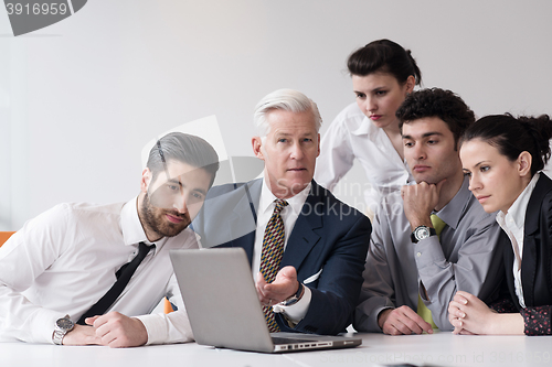 Image of business people group on meeting at modern startup office