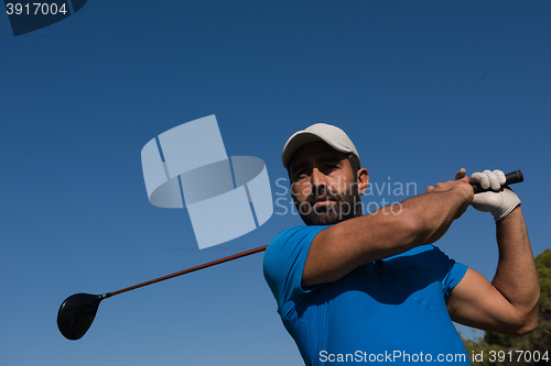 Image of golf player hitting shot