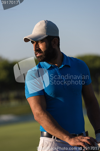 Image of golfer  portrait at golf course