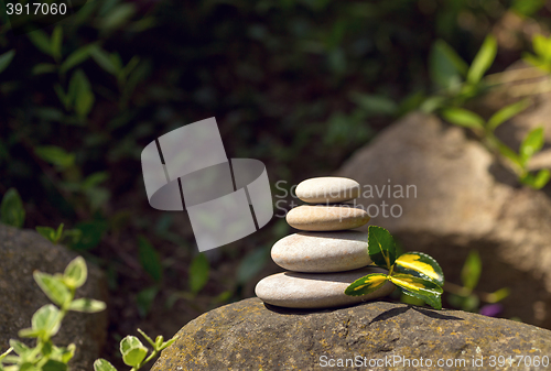 Image of Pile of balancing pebble stones outdoor