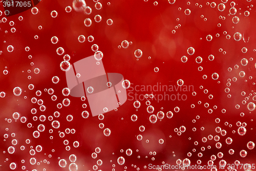 Image of red abstract background with water drops