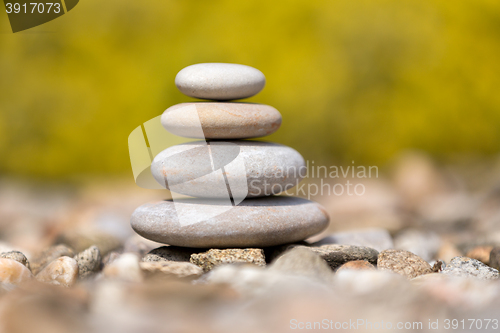 Image of Pile of balancing pebble stones outdoor