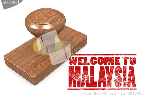 Image of Red rubber stamp with welcome to Malaysia