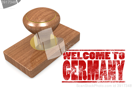 Image of Red rubber stamp with welcome to Germany
