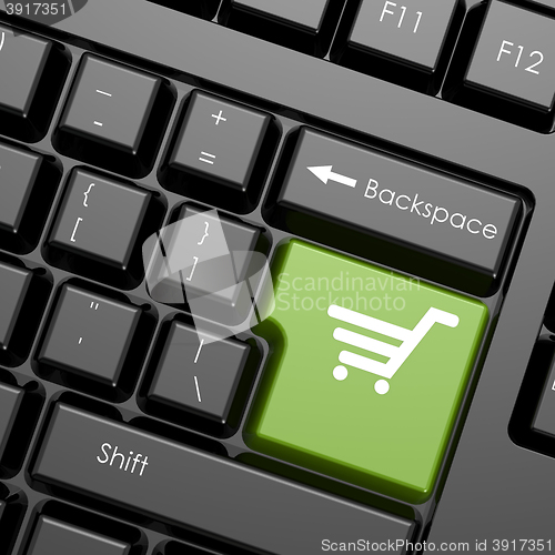 Image of Green enter button with shopping cart on black keyboard, isolate