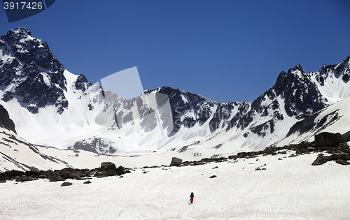 Image of Hiker in snowy mountains