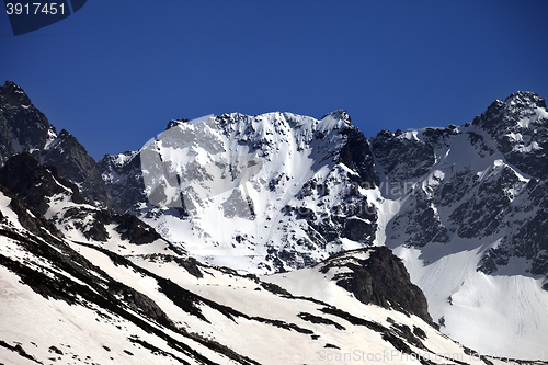 Image of Snowy rocks at nice spring day