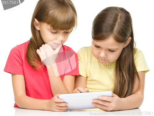 Image of Children are using tablet