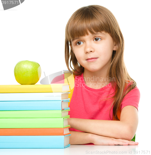 Image of Little girl with her books
