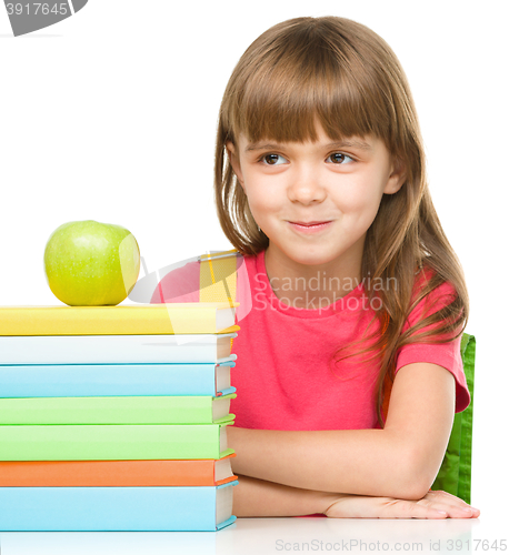 Image of Little girl with her books