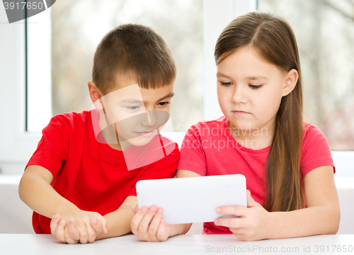 Image of Children are using tablet