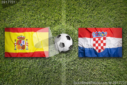 Image of Spain vs. Croatia flags on soccer field