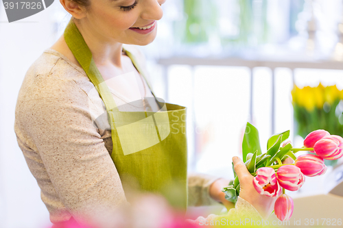 Image of close up of florist making bunch at flower shop