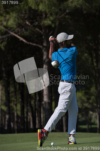 Image of golf player hitting shot