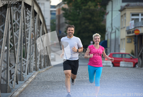 Image of couple jogging