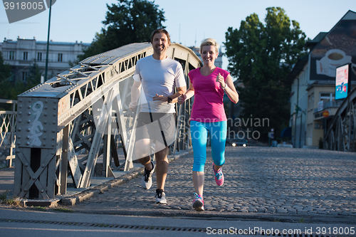 Image of couple jogging