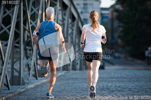 Image of couple jogging