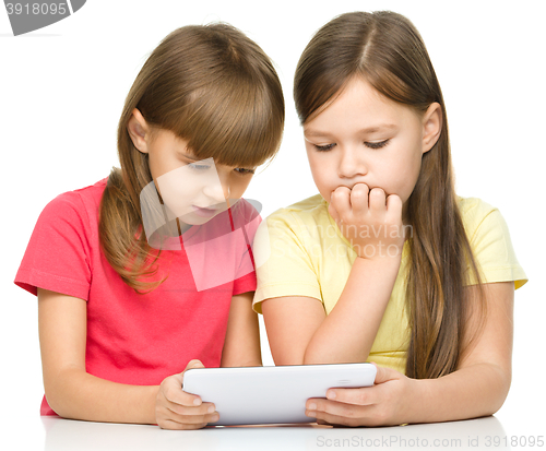 Image of Children are using tablet