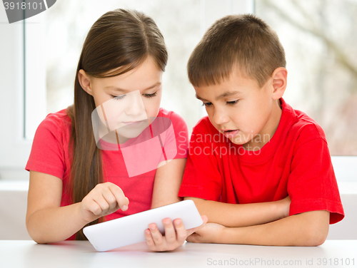 Image of Children are using tablet