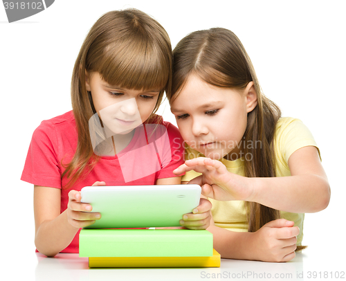 Image of Children are using tablet