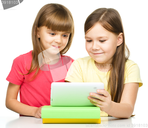 Image of Children are using tablet