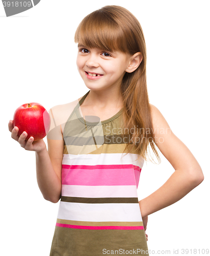 Image of Little girl with red apple