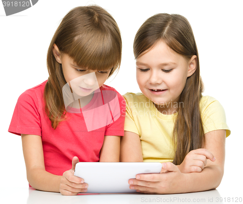 Image of Children are using tablet