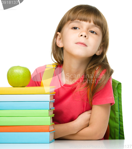 Image of Little girl with her books