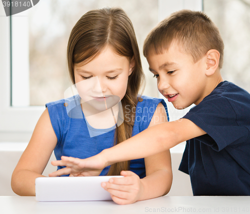 Image of Children are using tablet