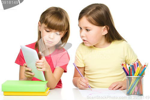 Image of Children are using tablet