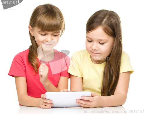 Image of Children are using tablet