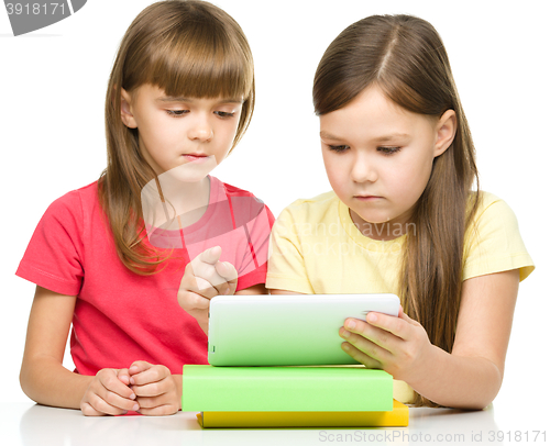 Image of Children are using tablet