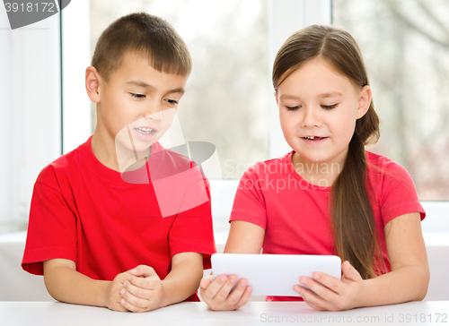 Image of Children are using tablet