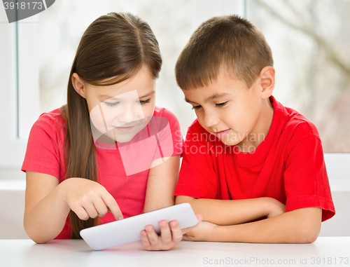 Image of Children are using tablet