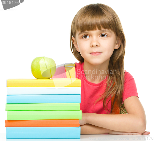 Image of Little girl with her books