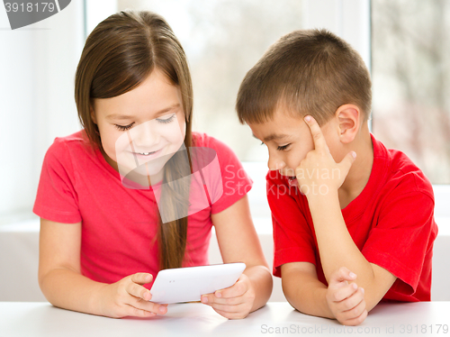 Image of Children are using tablet