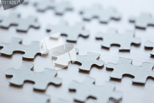 Image of close up of puzzle pieces on table