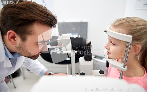 Image of optician with tonometer and patient at eye clinic